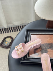 MULE SLIDE SANDALS IN PINK LAMBSKIN WITH LOGO STICKER DETAIL