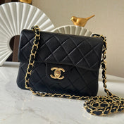 CHANEL 25S MINI FLAP BAG 18 IN BLACK LAMBSKIN WITH GOLD HARDWARE