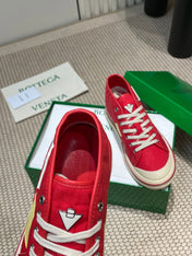 ELIOT SNEAKER IN CHERRY RED CANVAS AND CALFSKIN