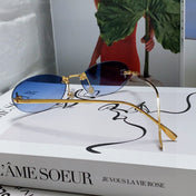 FIRST CRYSTAL RIMLESS OVAL FRAME SUNGLASSES 557152 IN METAL