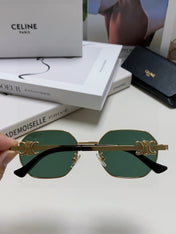 TRIOMPHE SUNGLASS 497821 IN GOLD METAL DARK TEAL LENSES