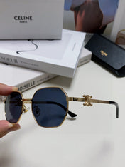 TRIOMPHE SUNGLASS 497823 IN GOLD METAL BLACK LENSES