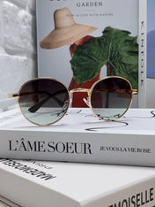 SIGNATURE ROUND SUNGLASS 581381 IN GOLD METAL GREY SMOKE LENSES