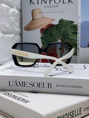 TRIOMPHE SUNGLASSES 548593 IN BLACK AND WHITE ACETATE