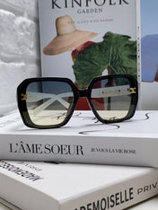 TRIOMPHE SUNGLASSES 548593 IN BLACK AND WHITE ACETATE