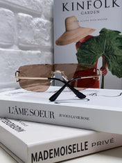 C DE RIMLESS NAVIGATOR FRAME SUNGLASSES 548665 IN METAL