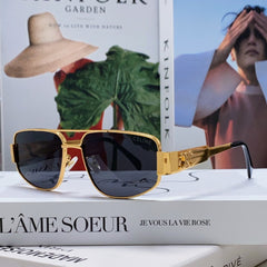 TRIOMPHE SUNGLASS 513000 IN GOLD METAL BLACK LENSES