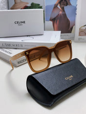 TRIOMPHE SUNGLASSES 552774 IN CARAMEL ACETATE TEXT LOGO