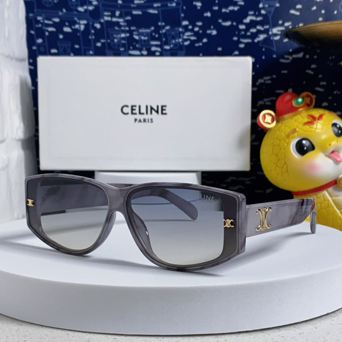 TRIOMPHE SUNGLASS 566217 IN MARBLED EFFECT ACETATE