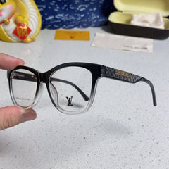 CAT EYE SUNGLASSES 570279 IN BLACK AND CLEAR ACETATE EMBOSSED LOGO