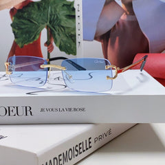 C DE RECTANGULAR RIMLESS FRAME SUNGLASSES  575769 IN METAL