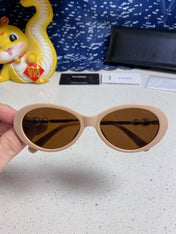 OVAL SUNGLASSES 640341 IN NUDE ACETATE METAL FRAME