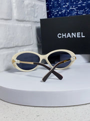 OVAL SUNGLASSES 640343 IN IVORY BROWN ACETATE METAL FRAME EMBOSSED PEARL