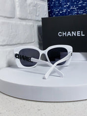 BUTTERFLY SUNGLASSES 641813 IN WHITE ACETATE BLACK METAL LOGO