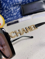 BUTTERFLY SUNGLASSES 641816 IN BLACK ACETATE GOLD METAL LOGO