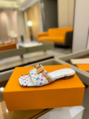 LV X TM 6AM FLAT MULE IN WHITE MONOGRAM CALFSKIN