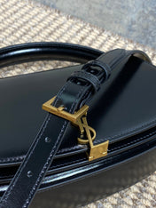 VOLTAIRE HALF-MOON SHOULDER BAG 24 IN BLACK CALFSKIN GOLD METALLIC