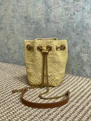 DRAWSTRING BUCKET BAG 19 IN BEIGE WOVEN RAFFIA AND CALFSKIN