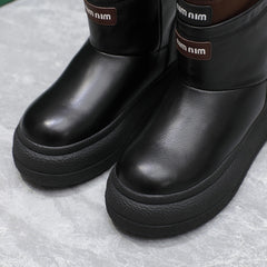 THICK-SOLED SNOW BOOTS IN BLACK CALFSKIN MIX CHOCOLATE NYLON