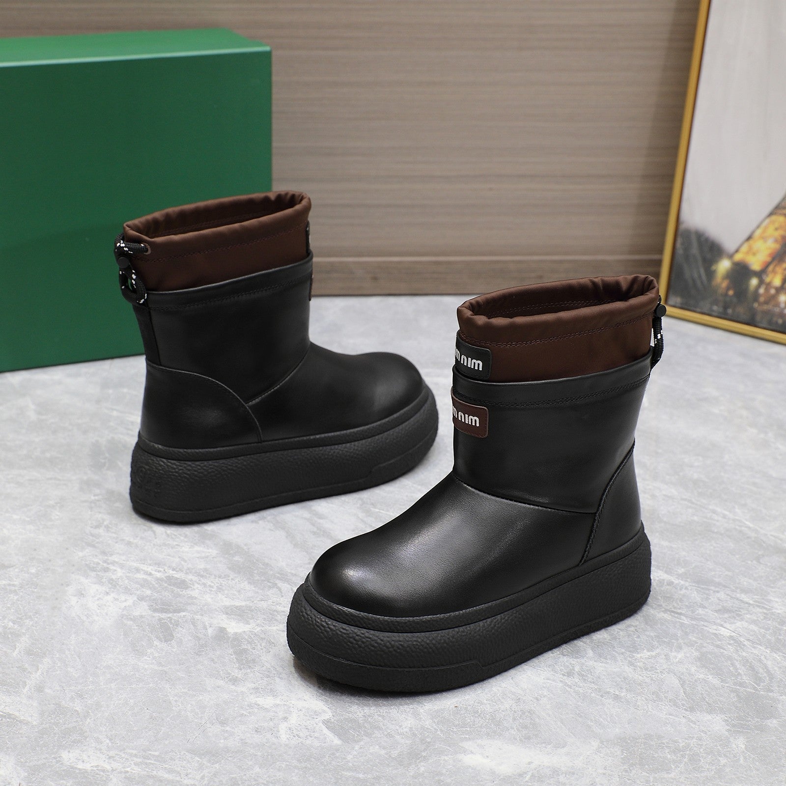 THICK-SOLED SNOW BOOTS IN BLACK CALFSKIN MIX CHOCOLATE NYLON