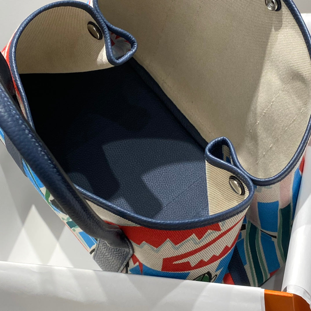 GARDEN PARTY 36 IN MULTICOLOR TOILE H CANVAS BLUE NAVY CALFSKIN TROPICAL ABSTRACT LANDSCAPE PRINT