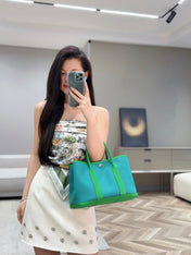 GARDEN PARTY 30CM IN CADMIUM GREEN TOILETS COTTON CANVAS AND GREEN CALFSKIN