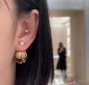 CD 26S DOUBLE PEARL ORBIT EARRINGS IN GOLD TONE METAL 630833