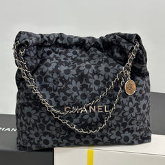 LARGE DRAWSTRING FLORAL PRINT SHOULDER BAG 39 IN BLACK MIX GREY DENIM