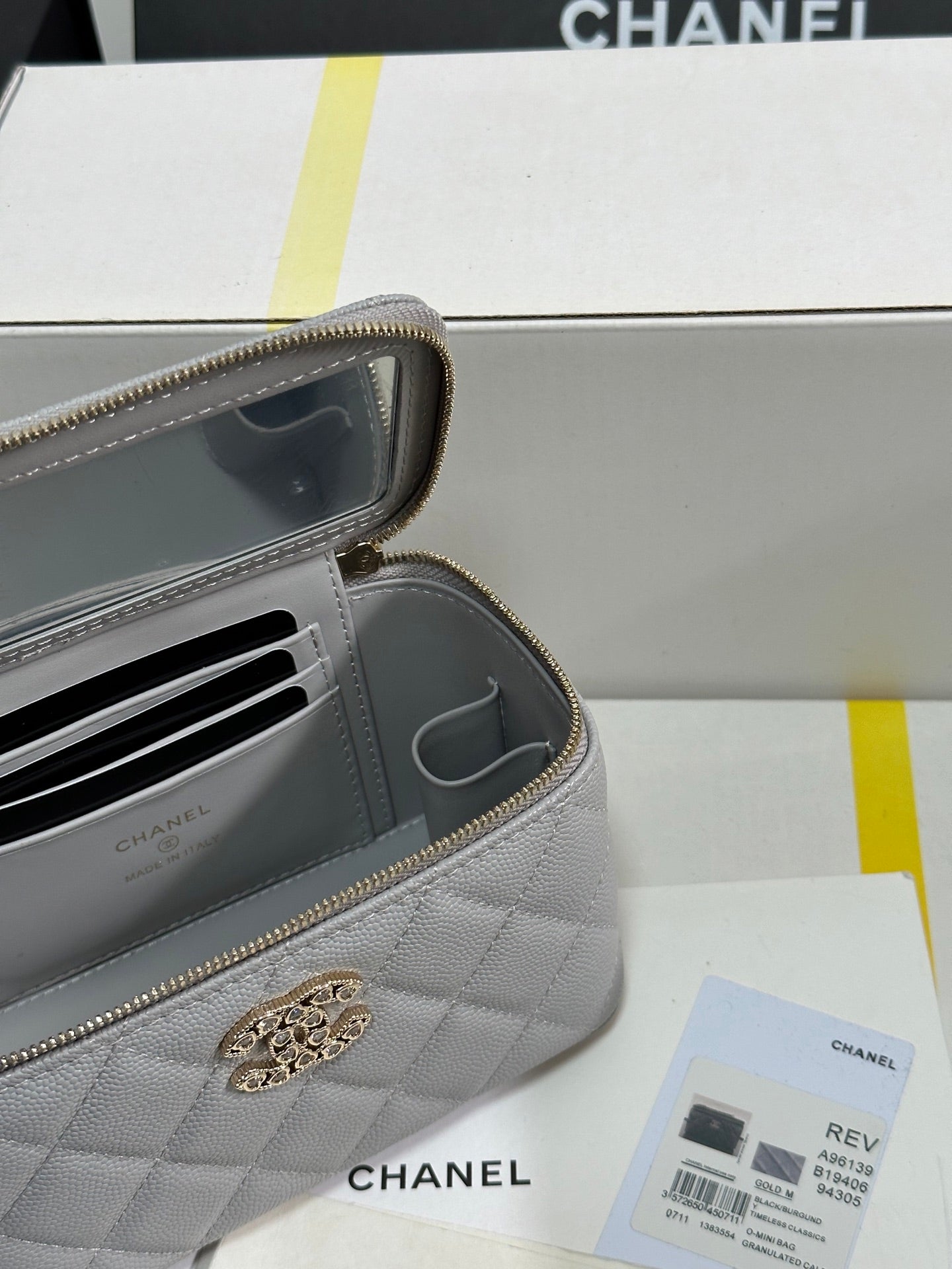 VANITY CASE 17 CRYSTAL STUDDED LOGO IN GREY CALFSKIN GOLD HARDWARE