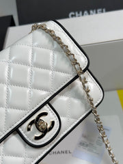 QUILTED FLAP BAG WITH BLACK TRIM 19 IN WHITE LAMBSKIN