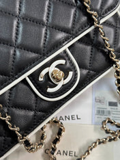 QUILTED FLAP BAG WITH WHITE TRIM 19 IN BLACK LAMBSKIN