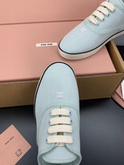MIUMIU 26S LACE UP SNEAKERS IN PALE MINT CANVAS RUBBER SOLE