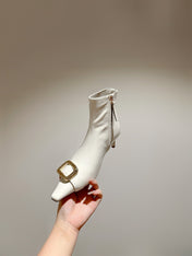 VIV CANARD ANKLE BOOTS IN WHITE GLOSSY CALFSKIN