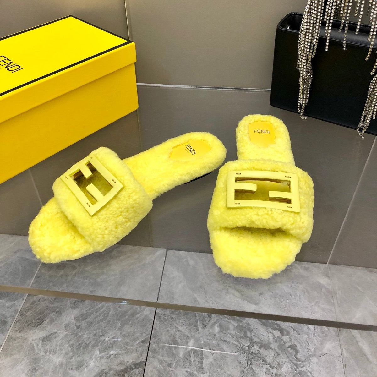 FENDI BAGUETTE SLIDE SLIPPERS IN BRIGHT YELLOW WOOL