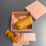 MICRO BAG KEYCHAIN 11  IN INDOCHINE ORANGE CALFSKIN EMBOSSED LOGO