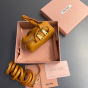 MICRO BAG KEYCHAIN 11  IN INDOCHINE ORANGE CALFSKIN EMBOSSED LOGO