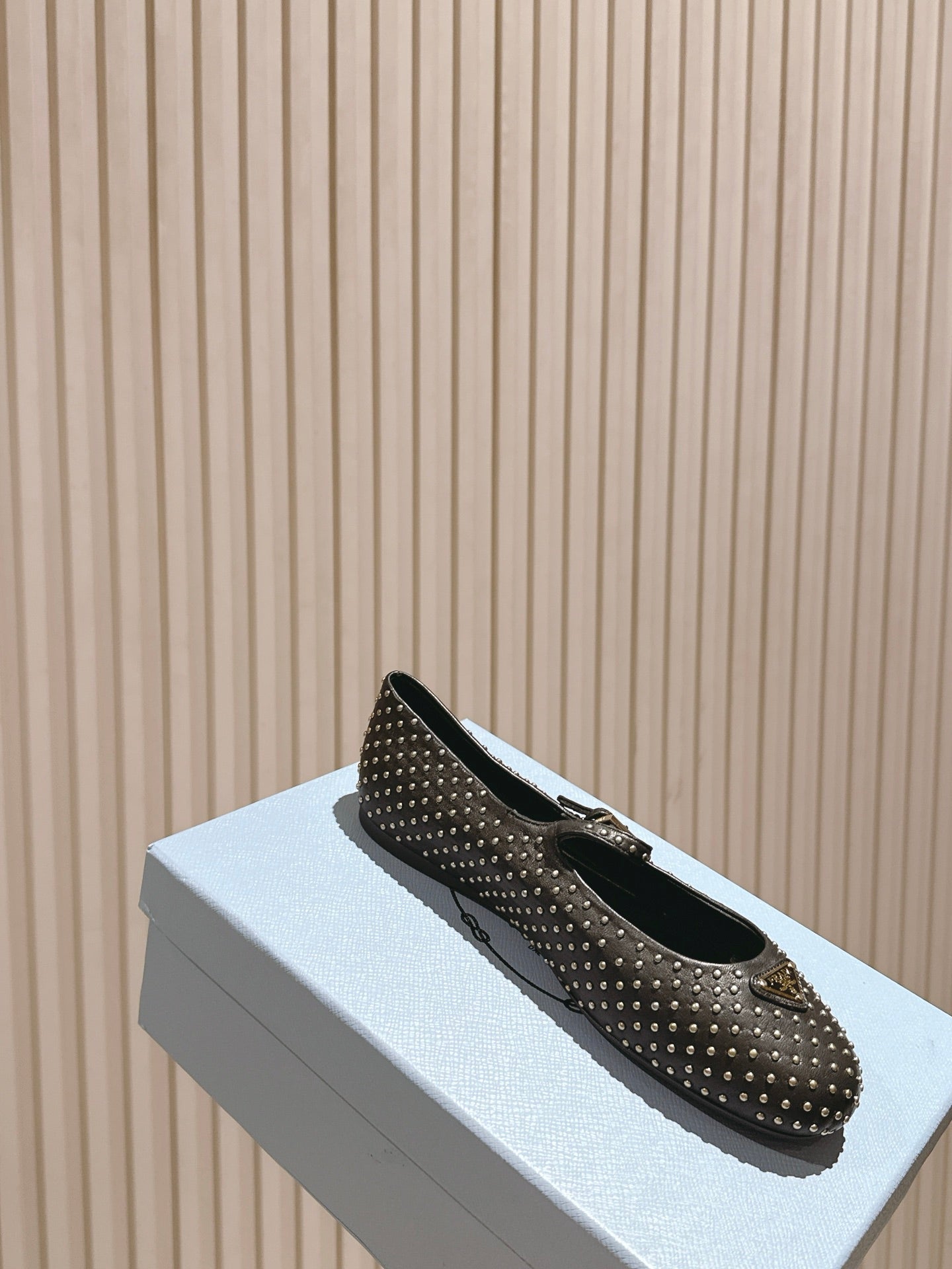 PRADA 25S STUD EMBELLISHED BALLERINA IN BLACK CALFSKIN