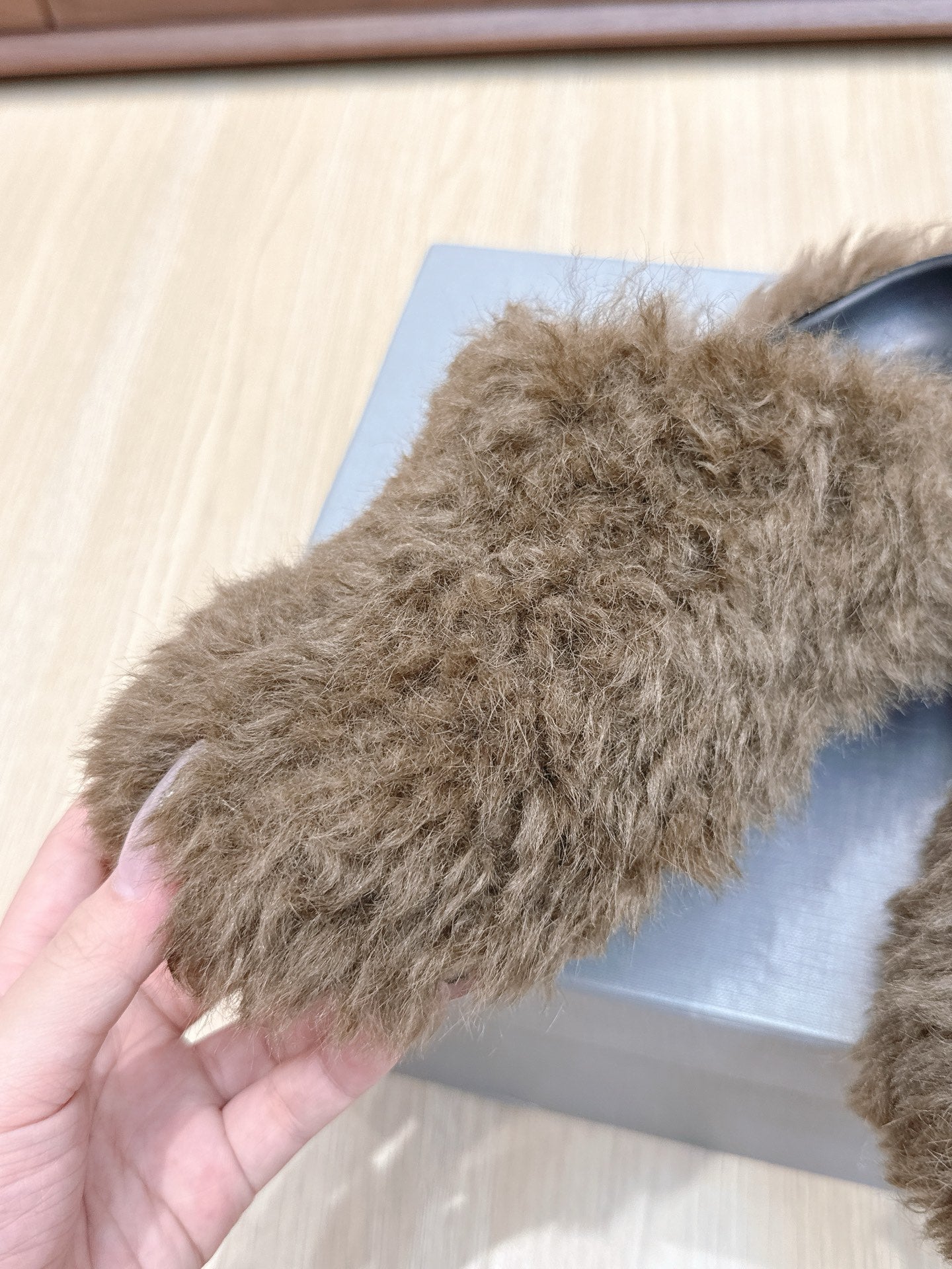BALENCIAGA 25S MULES IN BROWN FAUX FUR