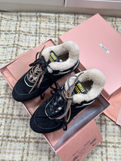 MIUMIU 26S SNEAKERS IN BLACK SUEDE AND SHEARLING