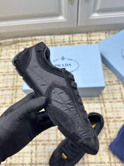 PRADA 26S LOW TOP SNEAKERS IN BLACK NYLON AND SUEDE