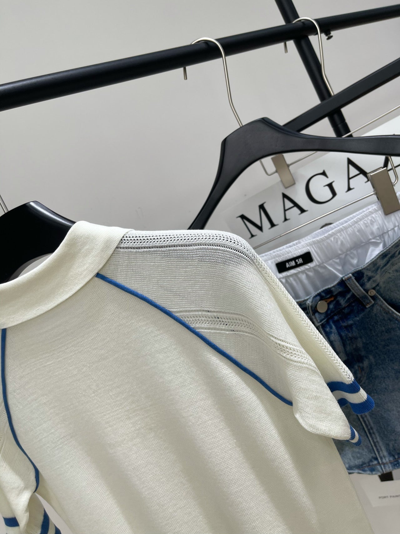 MIUMIU SHORT-SLEEVE RAGLAN POLO SHIRT IN BLUE AND WHITE 267966