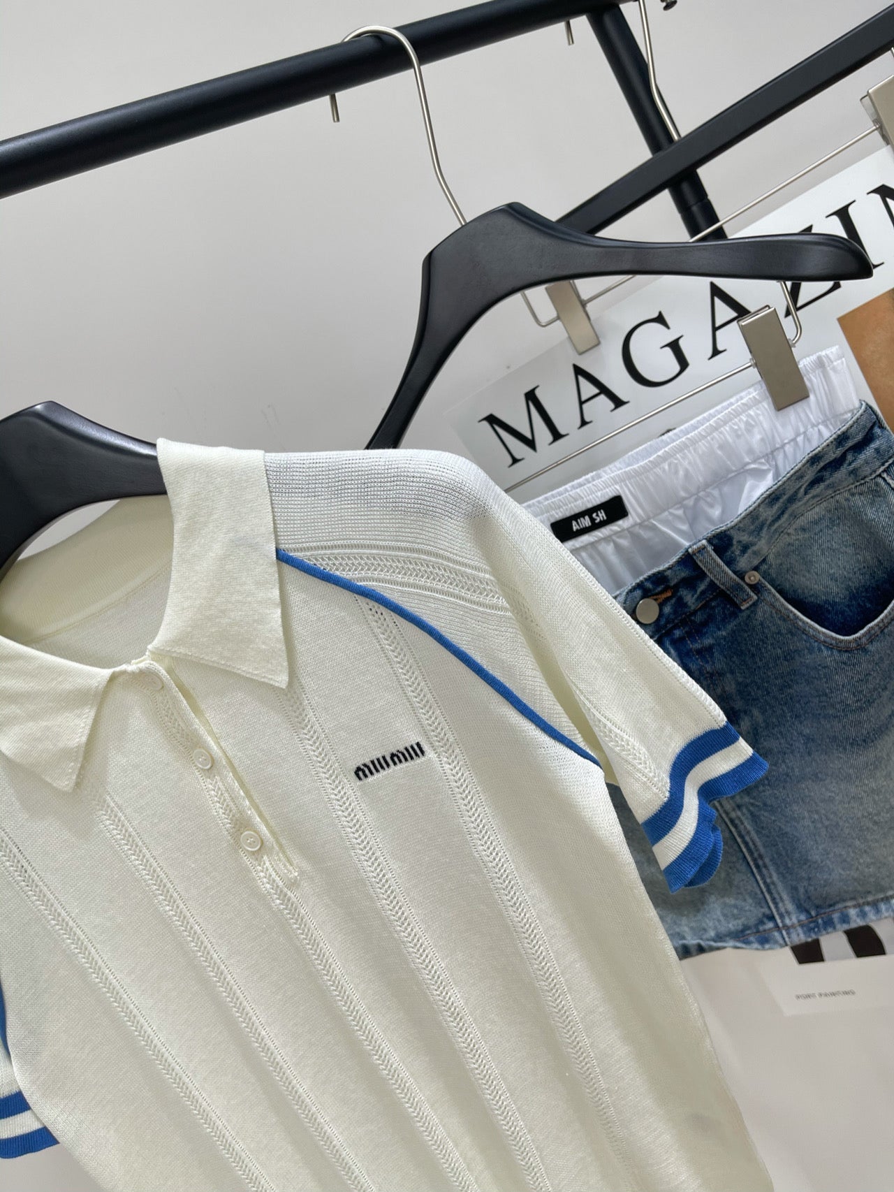 MIUMIU SHORT-SLEEVE RAGLAN POLO SHIRT IN BLUE AND WHITE 267966