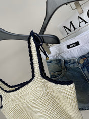 CELINE OPEN-KNIT FLORAL PATTERN KNIT VEST 275887