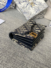 SADDLE LOTUS WALLET 11 IN BLACK MONOGRAM OBLIQUE JACQUARD