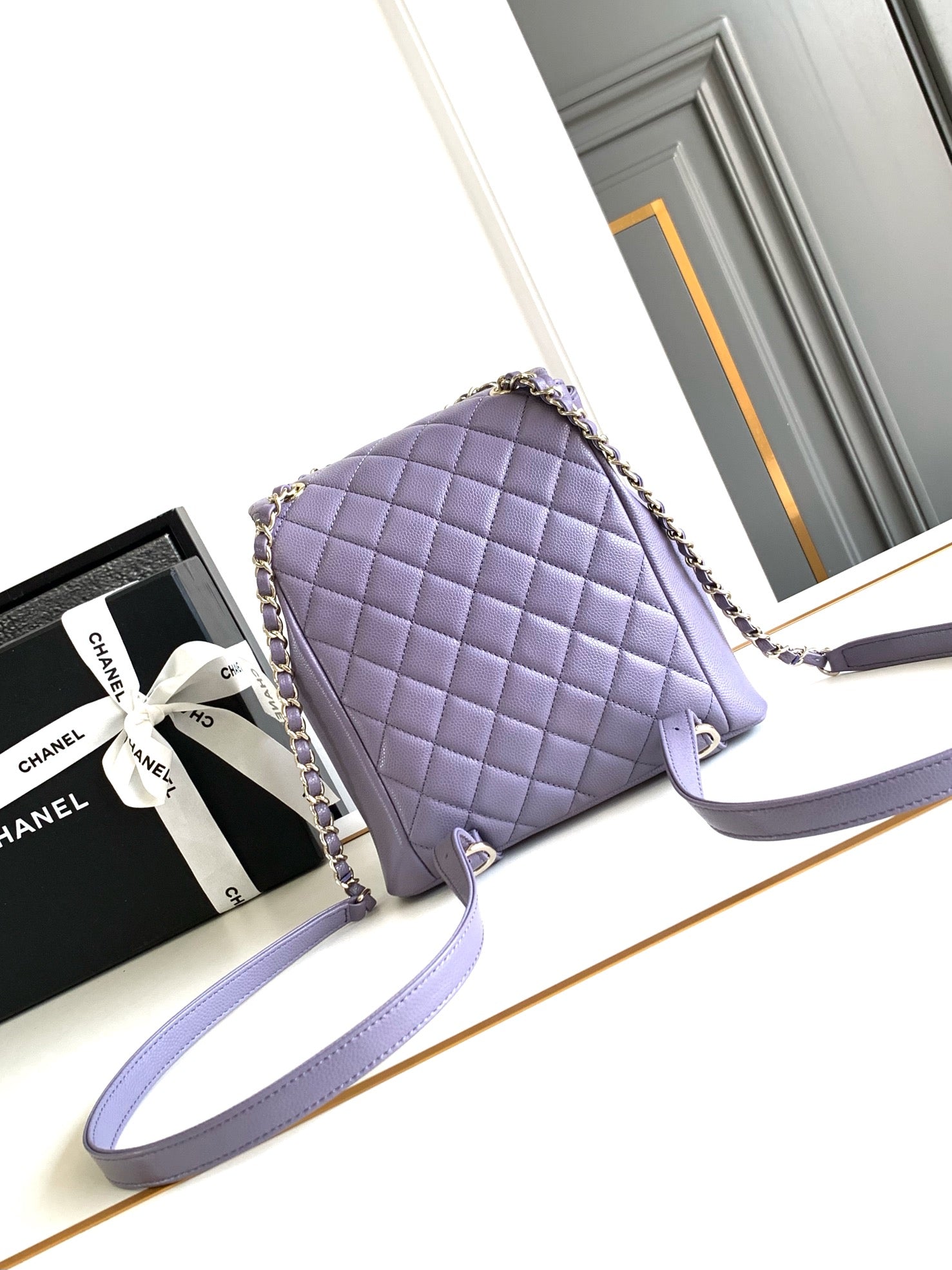 CHANEL 25S BACKPACK 17.5 CM IN PURPLE LAMBSKIN