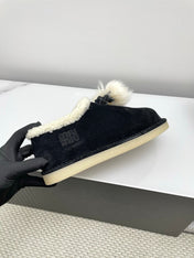 MIUMIU 26S ANKLE SHEARLING BOOTS IN BLACK SUEDE