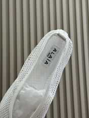 ALAIA FISHNET MESH BALLET FLATS 25S IN WHITE FABRIC