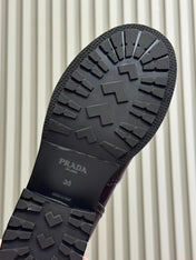 PRADA 25S ANKLE BOOTS IN BROWN CALFSKIN