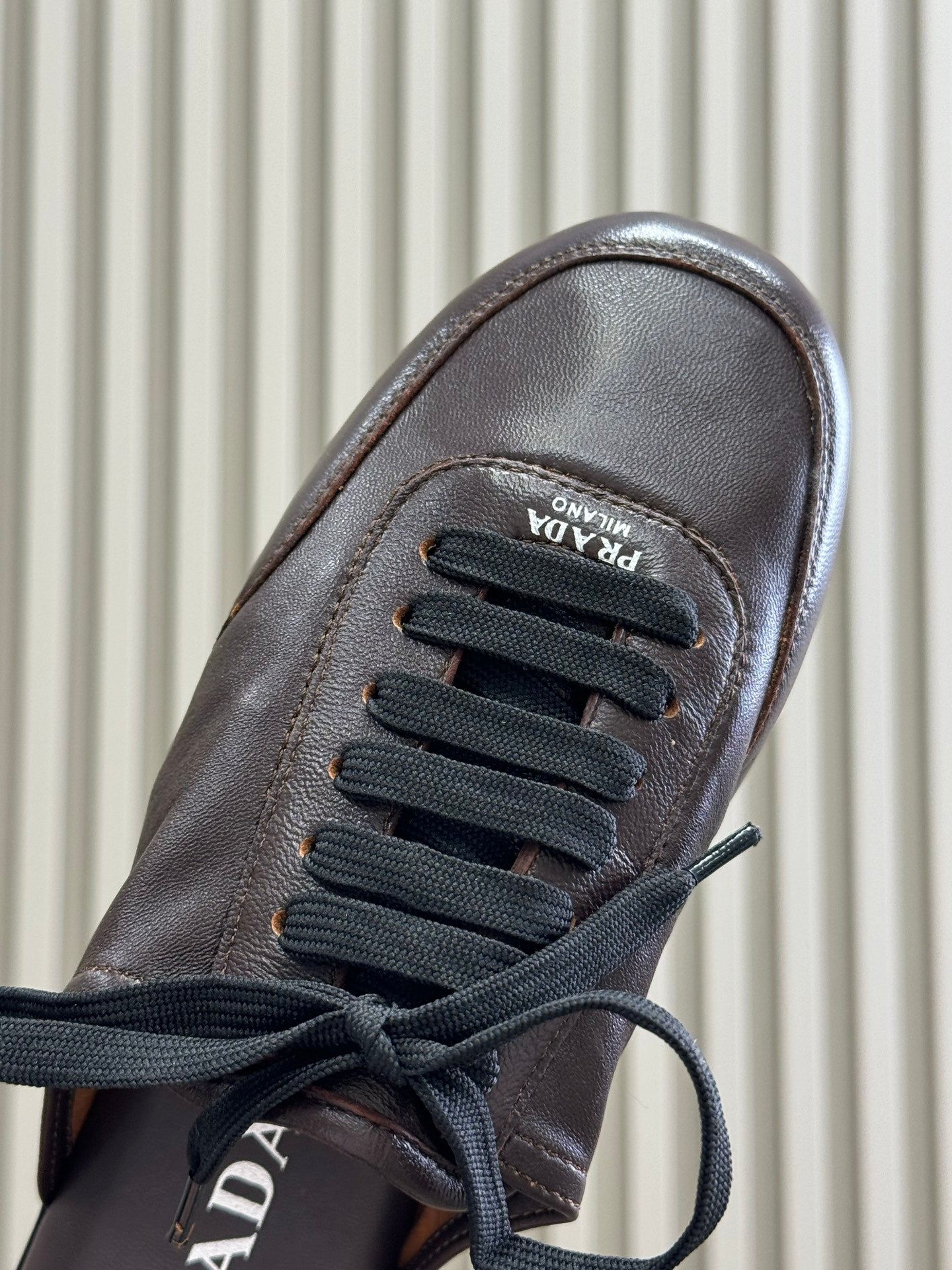 PRADA 25S COLLAPSE MULES IN DARK BROWN CALFSKIN