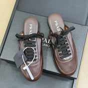 PRADA 25S COLLAPSE MULES IN DARK BROWN CALFSKIN